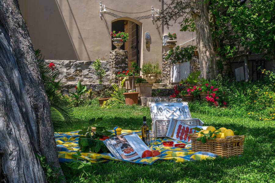 The old oven, and the oven today; a garden picnic, and the old kitchen, still in use.